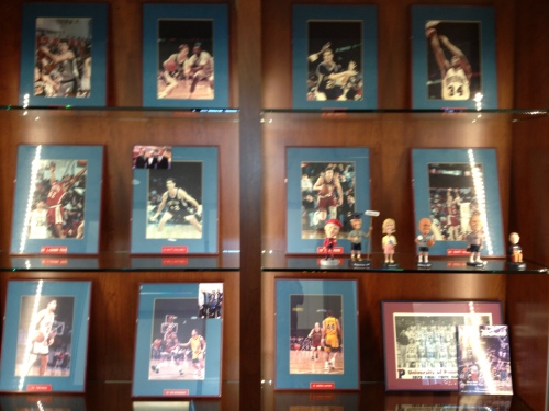 Some photos - and bobbleheads! - are already decorating the shelves outside the offices.